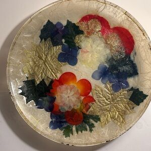 Decorative Floral Plate with Red, Blue, and Gold Accents